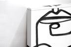 Close-up λεπτομέρεια της εκτύπωσης καμβά Many Faces.