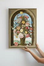 Hands holding Bosschaert canvas