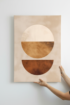 Hands holding Earth Circles canvas