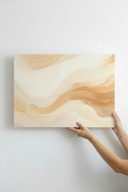 Hands holding Golden Waves canvas