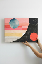 Hands holding Two Planets canvas