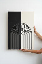 Hands holding vertical Arch Duality canvas