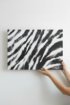 Hands holding Zebra Stripes canvas