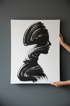 Large silhouette canvas held against grey wall