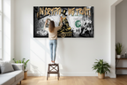 Lifestyle shot - Woman hanging canvas