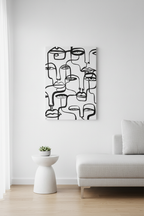 Many Faces canvas on white wall
